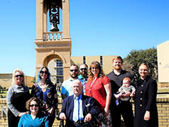 Johns family with newly dedicated clock tower Johns family with newly dedicated clock tower